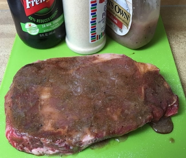 Marinating steak before air frying.